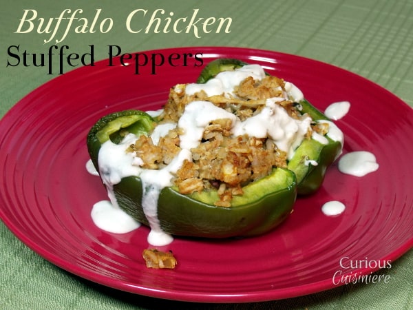Buffalo Chicken Stuffed Peppers来自Curious CuisinieregydF4y2Ba